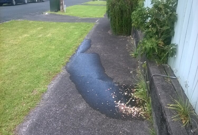 Image of a leak on a footpath